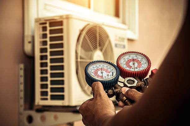 Professional Heat Pump Repair technician working in Northridge, CA